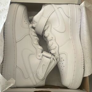 All white Air Force ones mid grade school